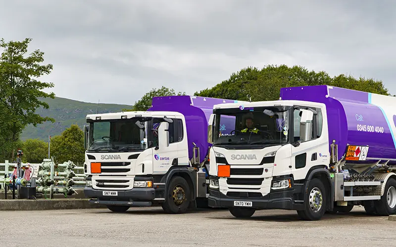 Two Certas Energy trucks parked.