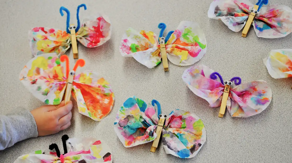 Colourful coffee filter butterflies with googly eyes craft