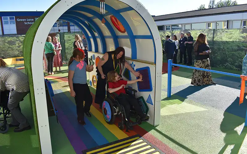 Children playing on the new playground.